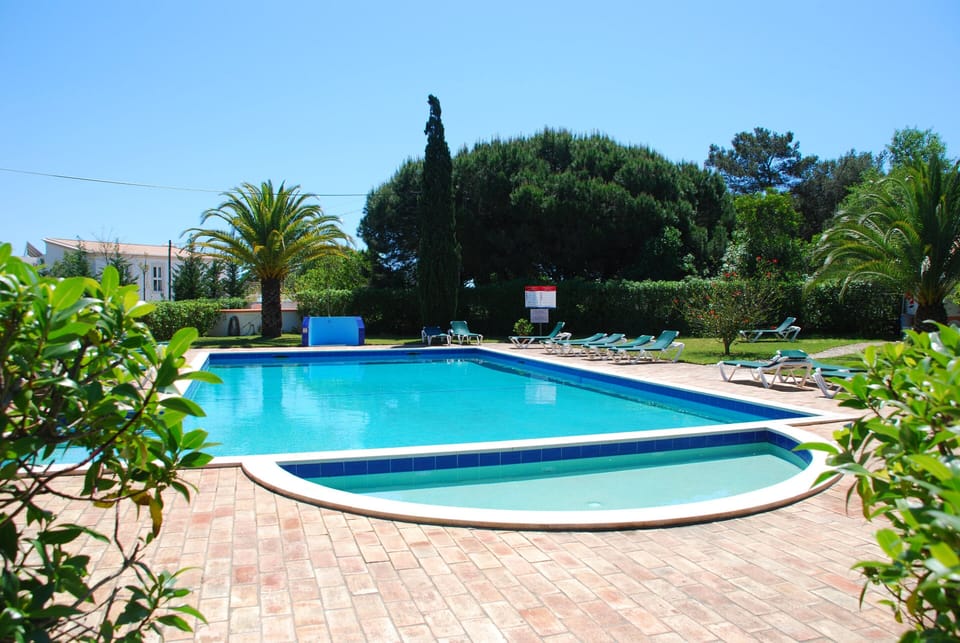 Swimming pool with children's paddle pool