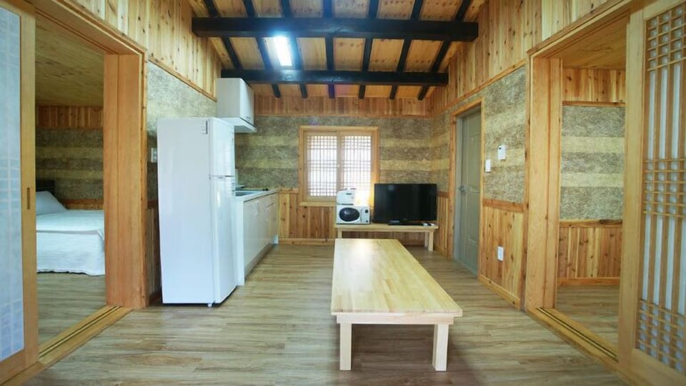 Traditional Double Room (20 PY) | Living area | 42-inch flat-screen TV with cable channels, TV