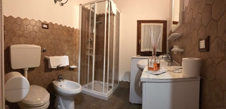 Bungalow, 2 Bedrooms, Patio | Bathroom | Shower, free toiletries, towels