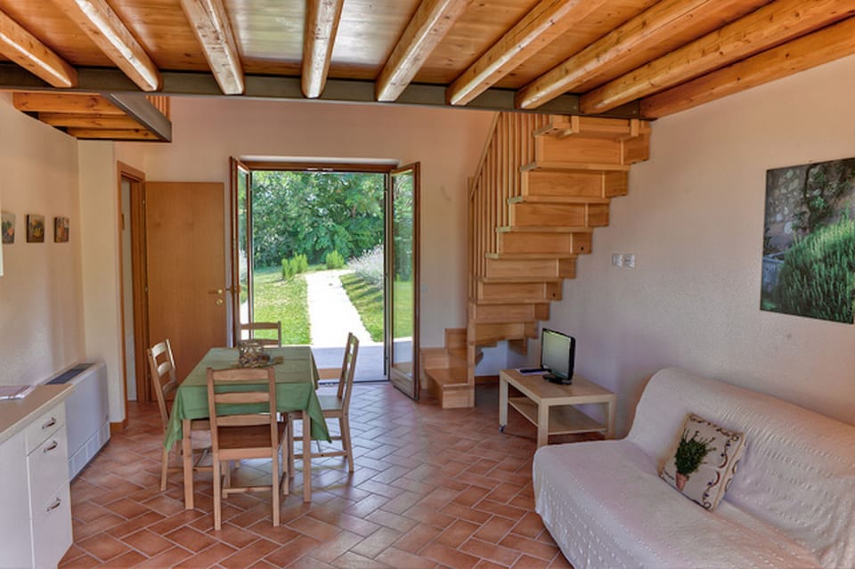 Family Studio, Non Smoking | Living area | Flat-screen TV