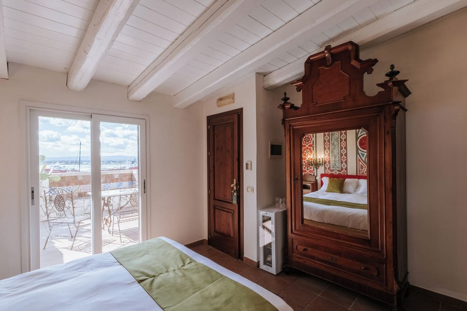 Romantic Suite, Terrace, Sea View | Premium bedding, down comforters, Select Comfort beds, minibar