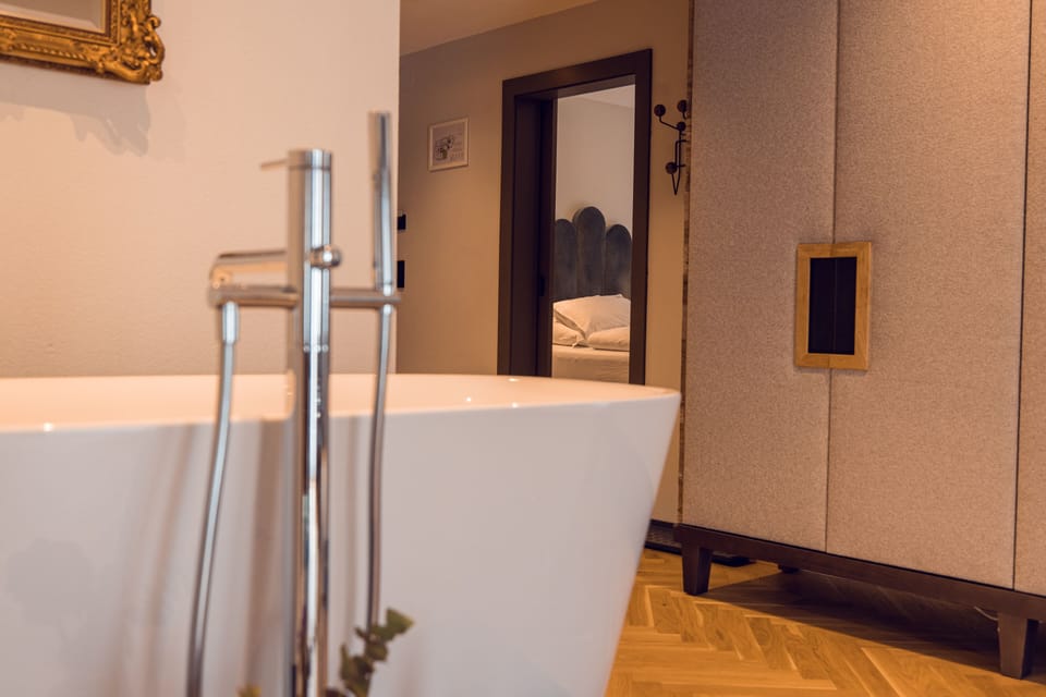 Classy Suite | Bathroom | Free toiletries, hair dryer, bathrobes, slippers