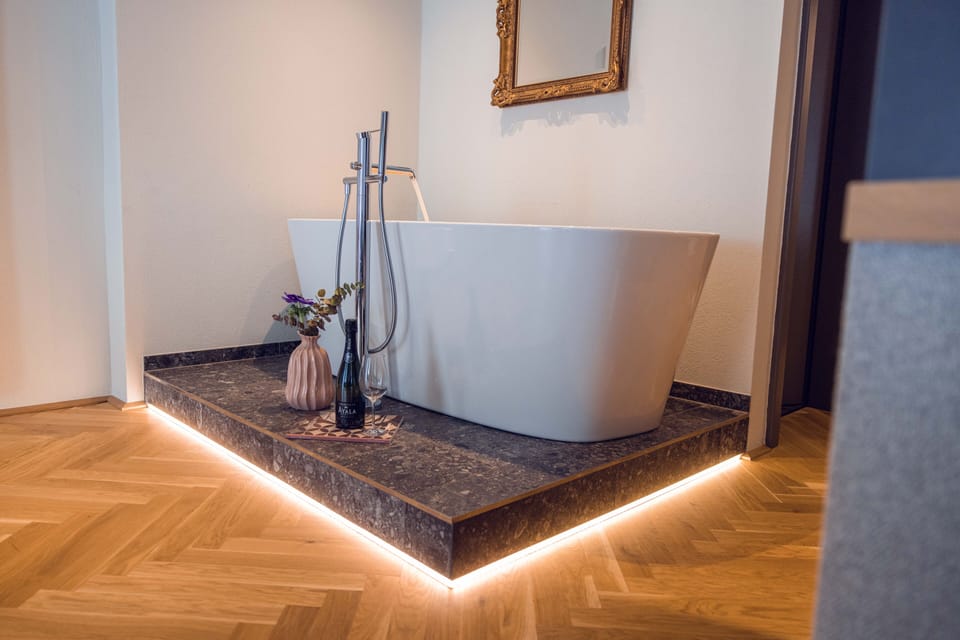 Classy Suite | Bathroom | Free toiletries, hair dryer, bathrobes, slippers