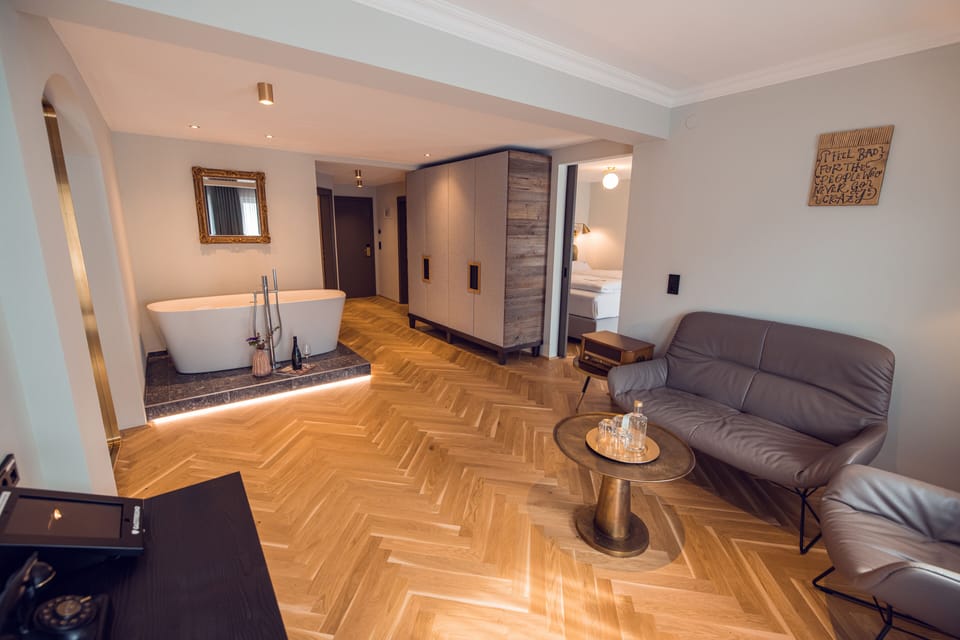 Classy Suite | Living area | Flat-screen TV