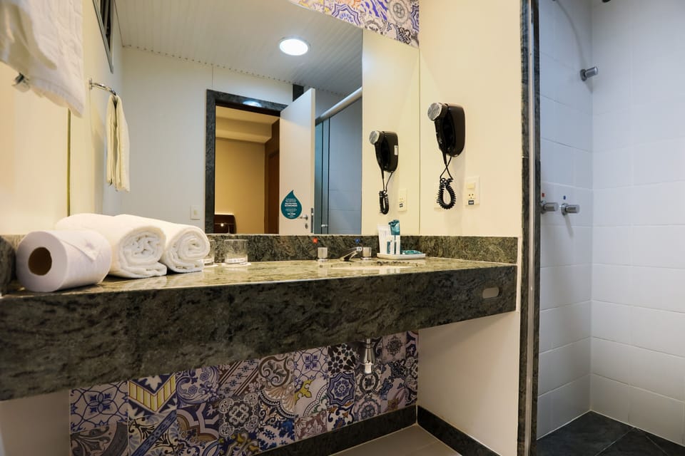 Shower, free toiletries, hair dryer, towels