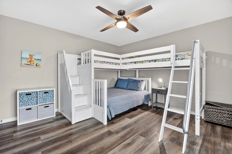Bunk room with queen and 2 twins