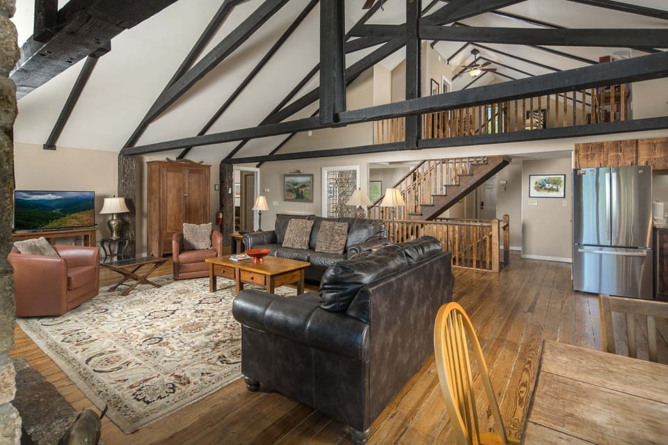 The open-concept living area offers plenty of space to gather and relax