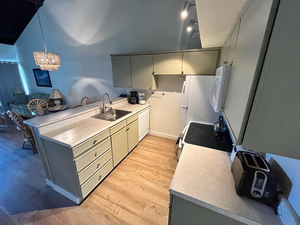 Fully furnished kitchen has everything you would want to fix your meals.