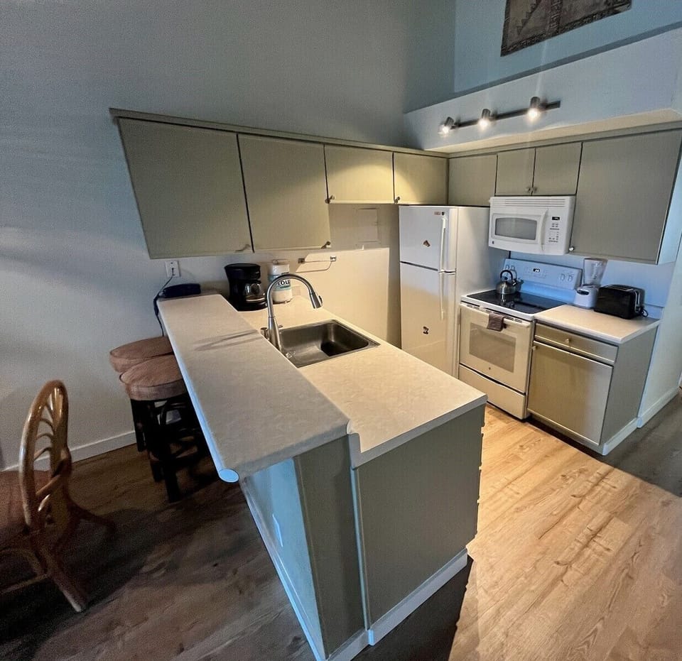 Fully furnished kitchen has everything you would want to fix your meals.