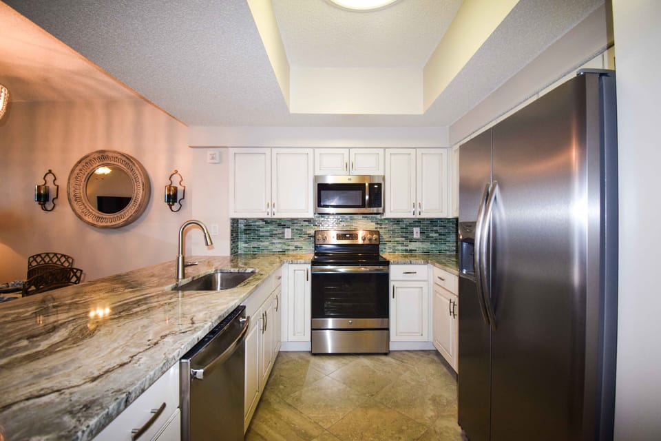 Find stainless appliances, custom cabinetry and granite in A202.