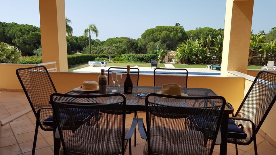 Main terrace with superb elevated views around the gardens & swimming pool area.