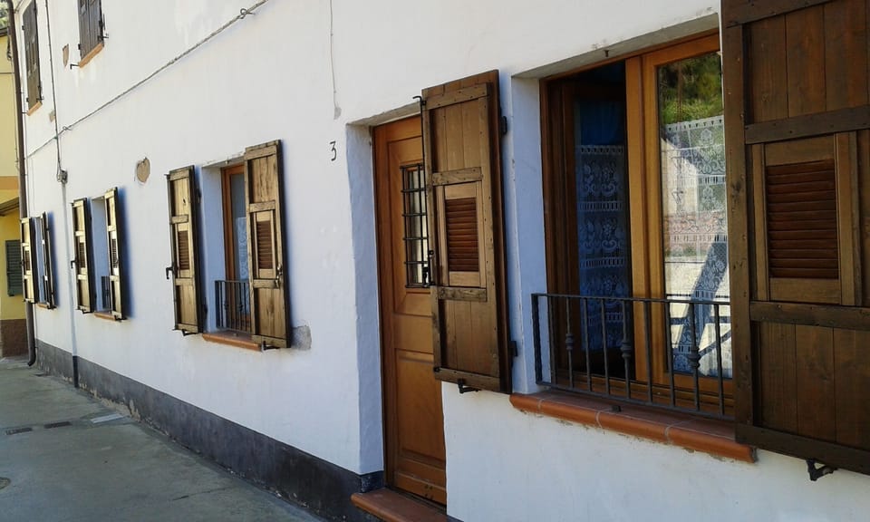 exterior with its wooden shutters.