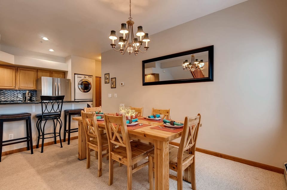 Dining at table for six or more and breakfast bar seats 4.