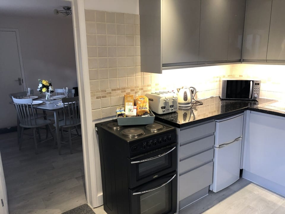 Kitchen leading  to lounge/diner