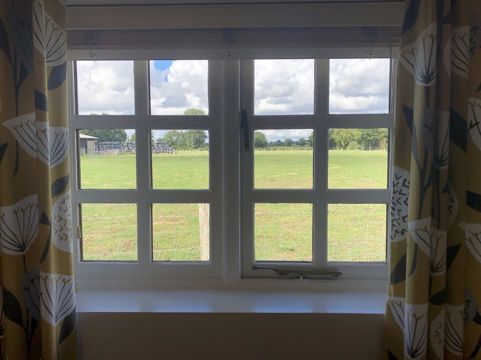 View out of rear window onto farmland