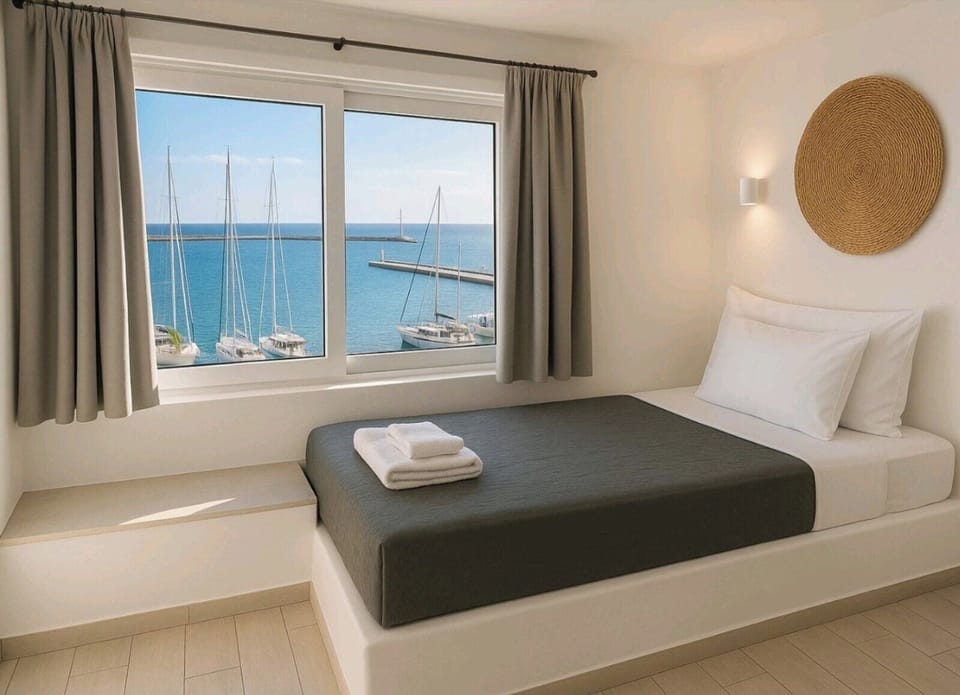 Quadruple Room, Sea View | In-room safe, iron/ironing board, free WiFi, bed sheets