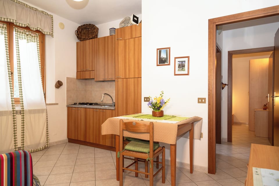 Classic Apartment, 1 Bedroom, Patio, Courtyard View | Living area | 22-inch flat-screen TV with digital channels, TV