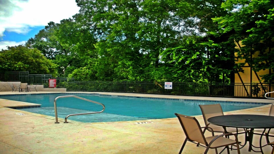 the unit is right next door to the pool and hot tub