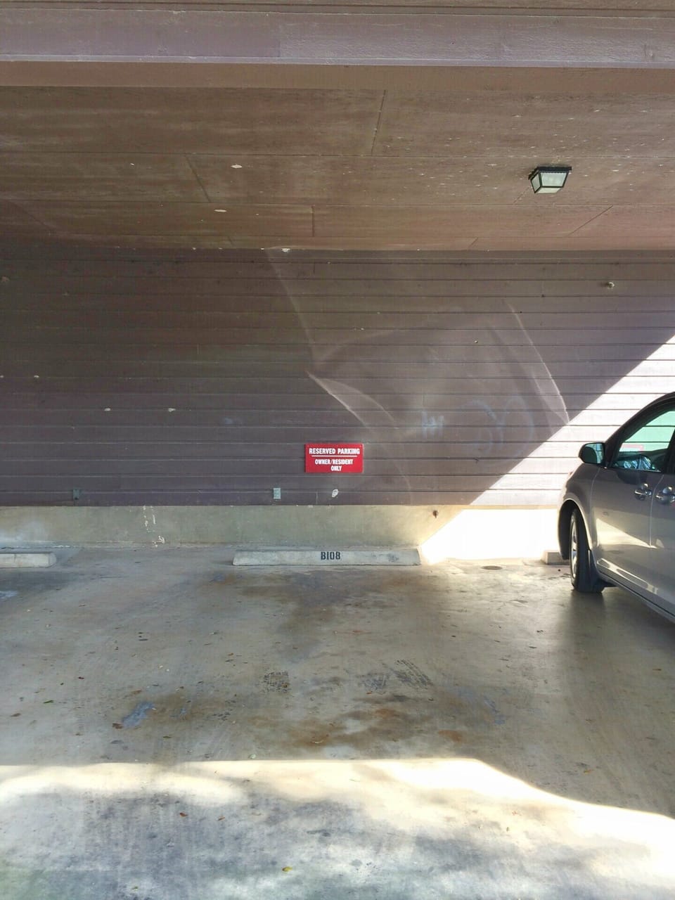 one covered designated parking spot for your unit