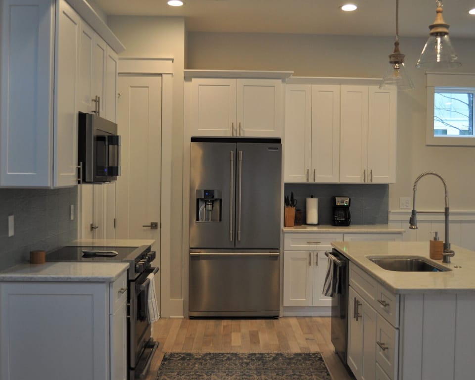 Kitchen with island and stainless steel appliances