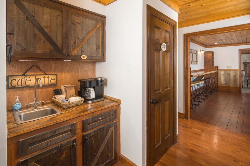 Coffee station with a sink and convenient access between the kitchen and dining room