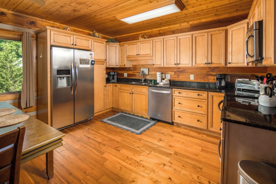 Well-equipped kitchen with ample counter space and stainless steel appliances