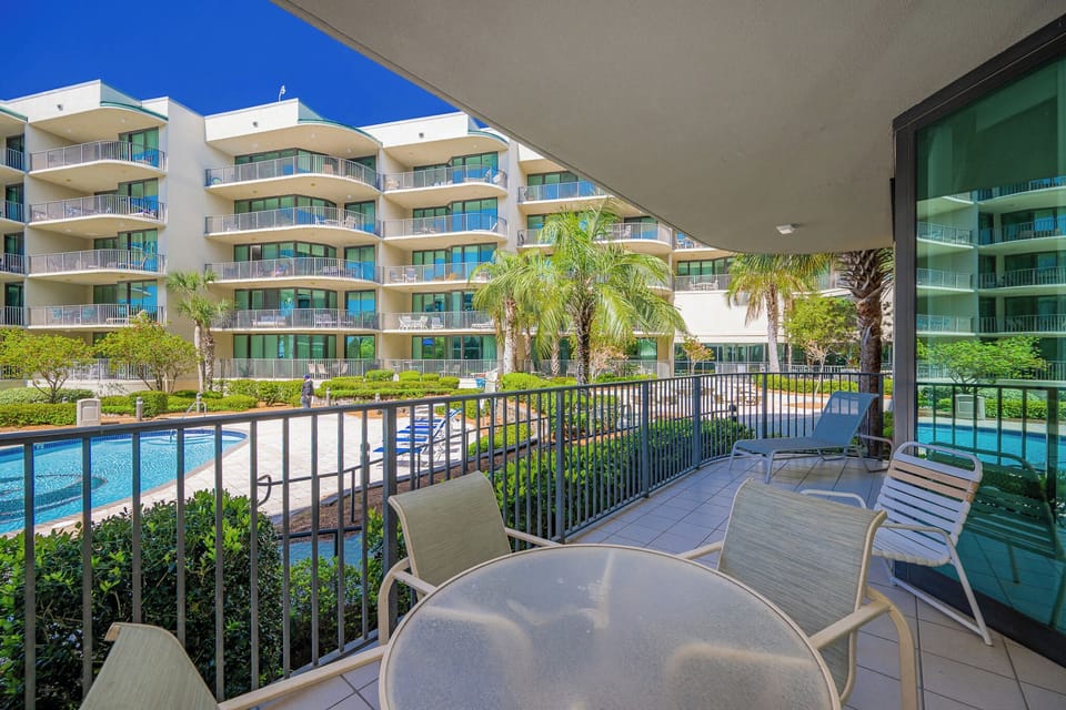 Relax on the balcony, sipping your favorite drink as you take in the coastal breezes and refreshing pool views