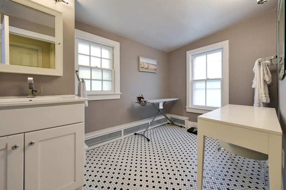 Second Bathroom w/makeup and iron tables
