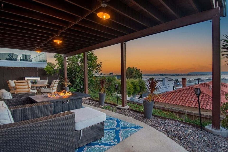 Relish outdoor living experiences on the patio, complete with a fire pit for delightful evenings with a view.