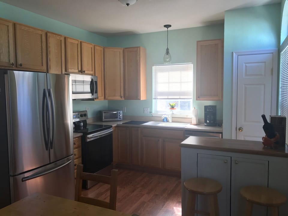 Recently updated kitchen with open floor plan opens into living room.