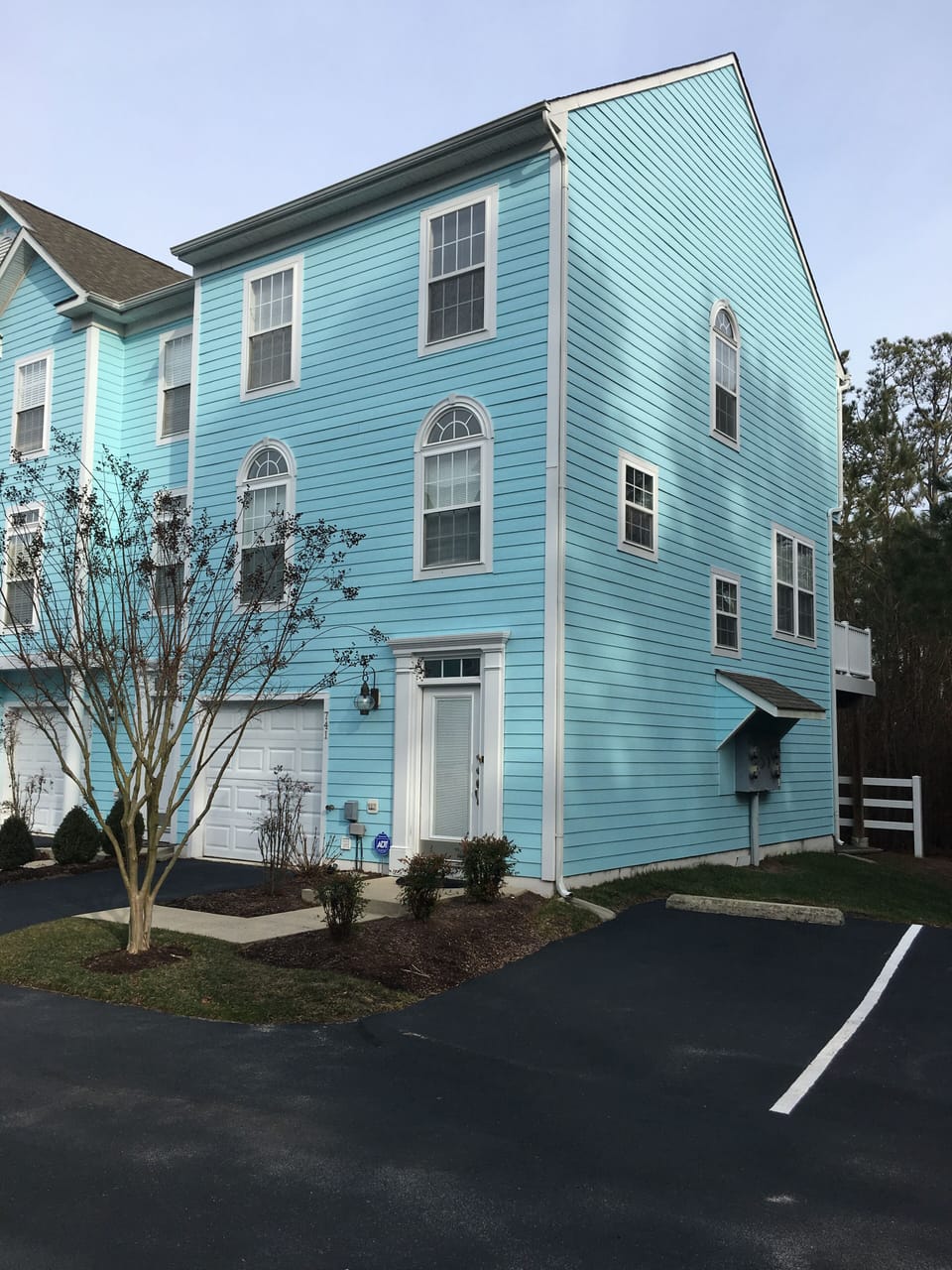 Spacious end unit with back deck & overflow parking right by the front entrance.