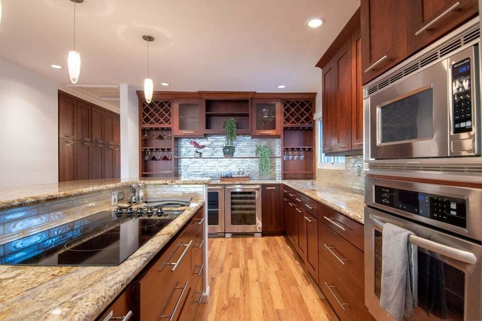 Discover culinary delights in the gourmet kitchen equipped with a Miele induction cooktop at—a dream space for food enthusiasts.