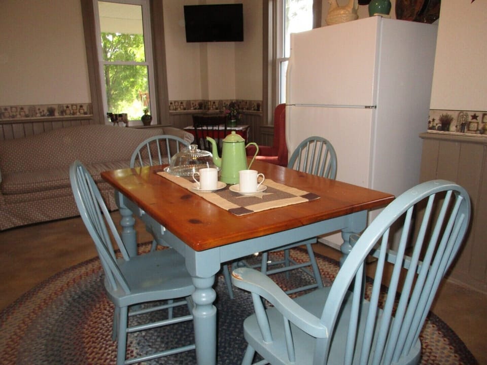 This cute, country kitchen offers places to sit and visit or eat.
