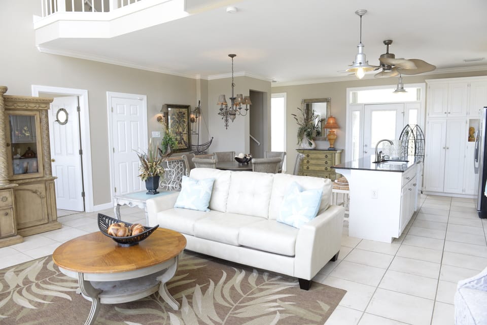 Enjoy the open floor plan of the living, kitchen, dining and a view of the Gulf!