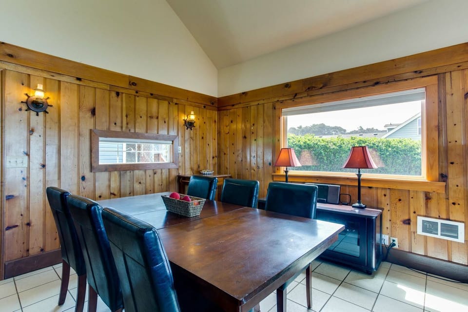 The roomy dining table is perfect for family meals or putting together puzzles.