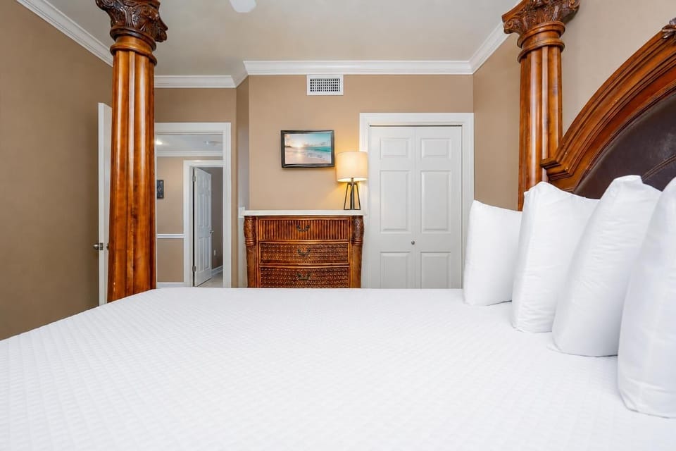 The guest suite invites you to rest on soft pillows while watching favorite shows on the wall-mounted TV