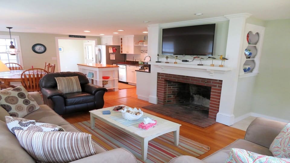 Cozy open living room offering a flat screen TV and WiFi throughout - 33 Pine Grove West Harwich Cape Cod -  New England Vacation Rentals