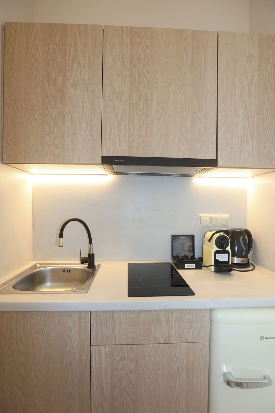 Fridge, stovetop, espresso maker, coffee/tea maker