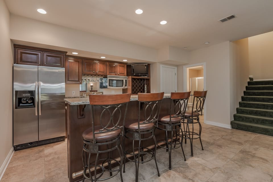 The celebration is not confined to one location. Downstairs we have a bar!