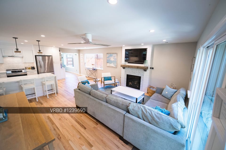 Cozy seating around the fireplace and TV. 