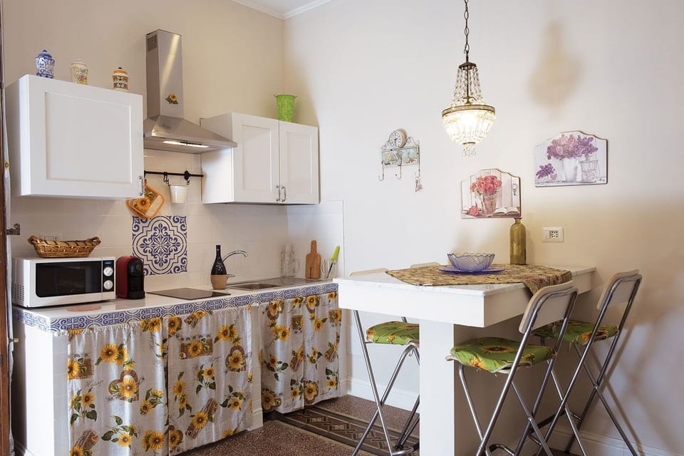 Deluxe Studio | Private kitchenette | Shared fridge, microwave, coffee/tea maker, electric kettle