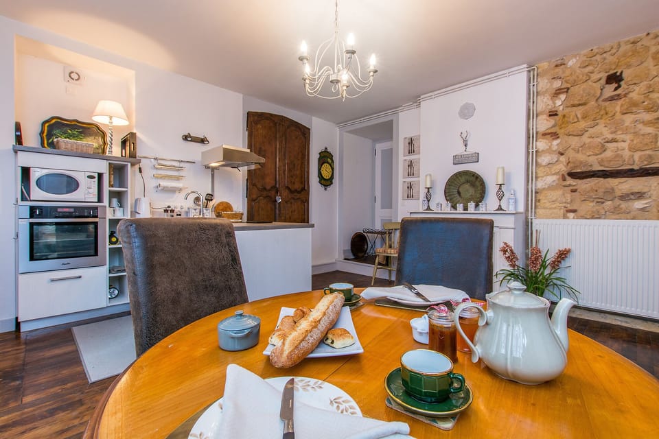 breakfast in the homely kitchen, with dining table and chairs