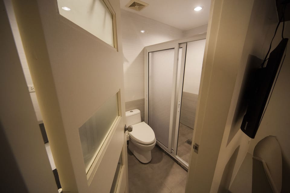 Shower, free toiletries, hair dryer, slippers