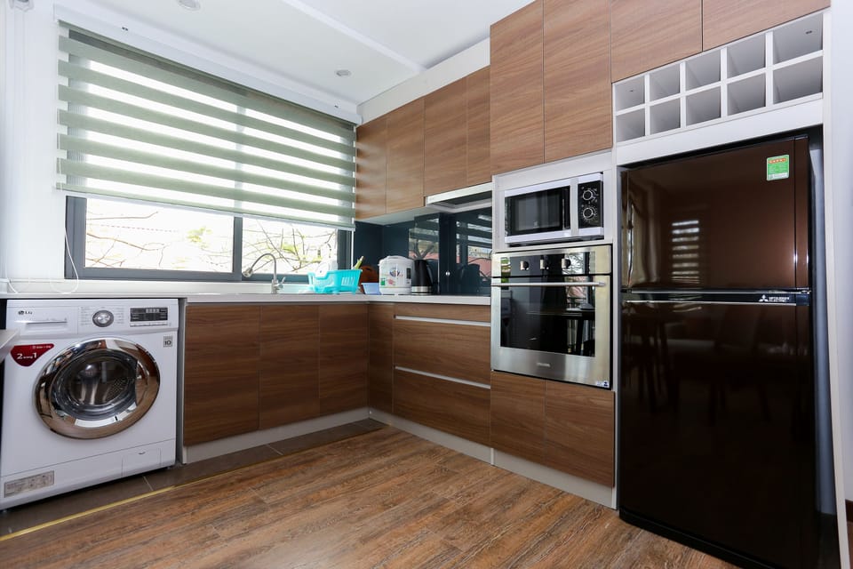 Apartment, Balcony | Private kitchenette | Fridge, microwave, stovetop, dishwasher