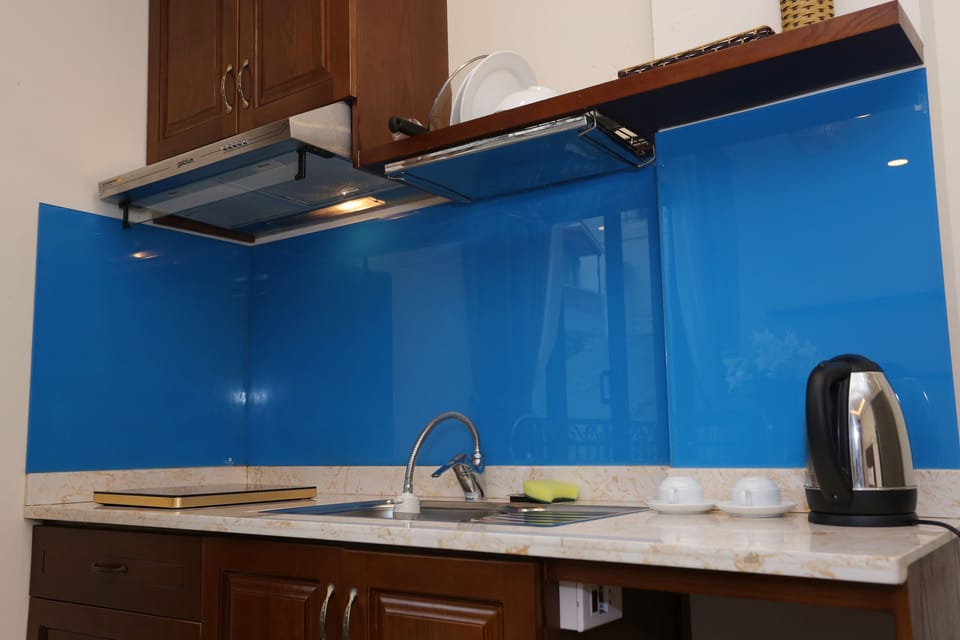 Apartment, Balcony | Private kitchen | Fridge, microwave, stovetop, dishwasher