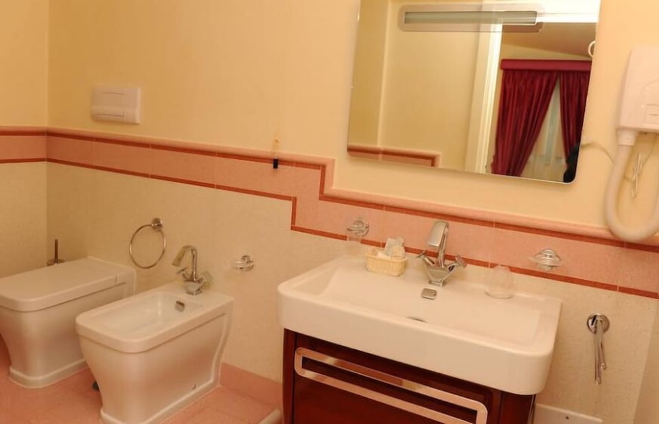 Shower, free toiletries, hair dryer, bathrobes