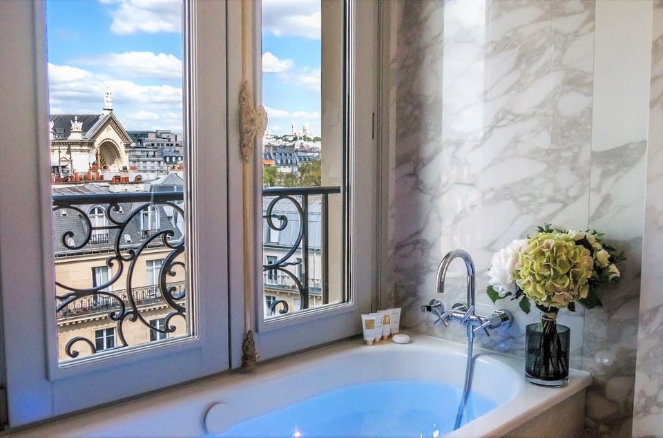 Designer toiletries, hair dryer, bathrobes, slippers