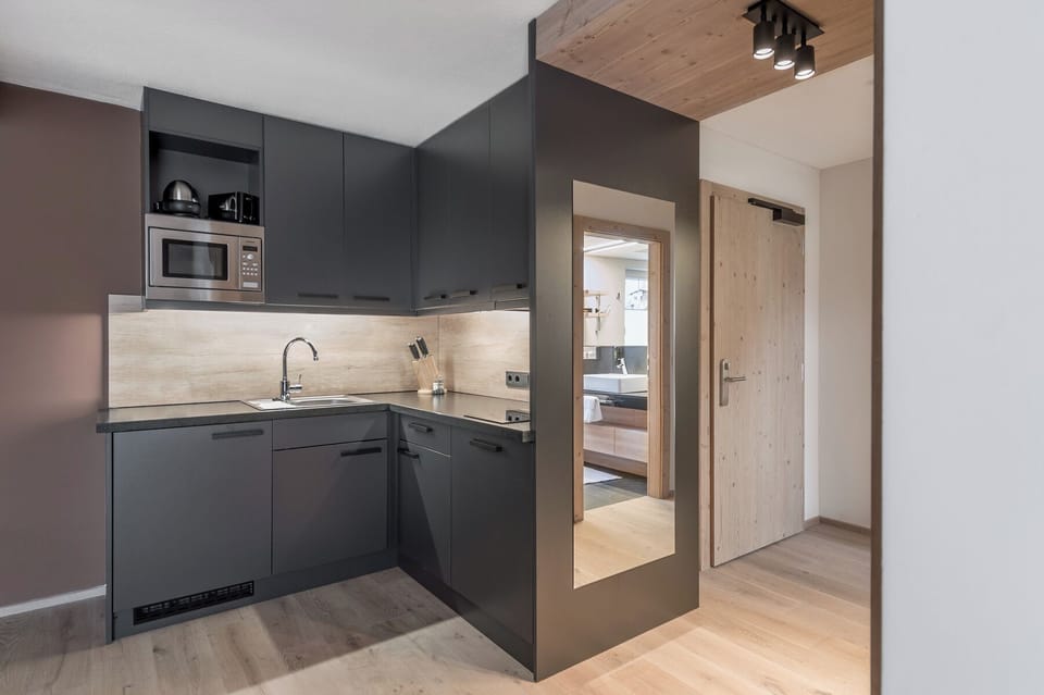 Suite, 1 Bedroom, Kitchenette | Private kitchen | Full-size fridge, microwave, stovetop, dishwasher