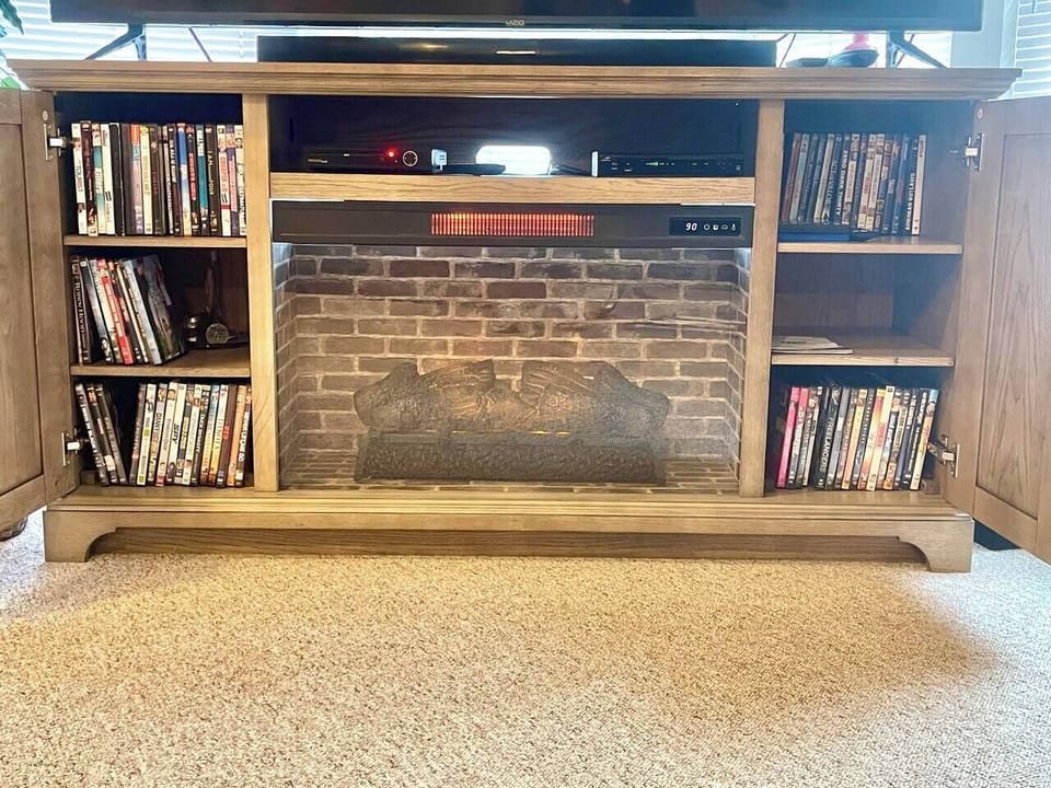 70” smartv with cable tv, dvd player and electric fireplace.