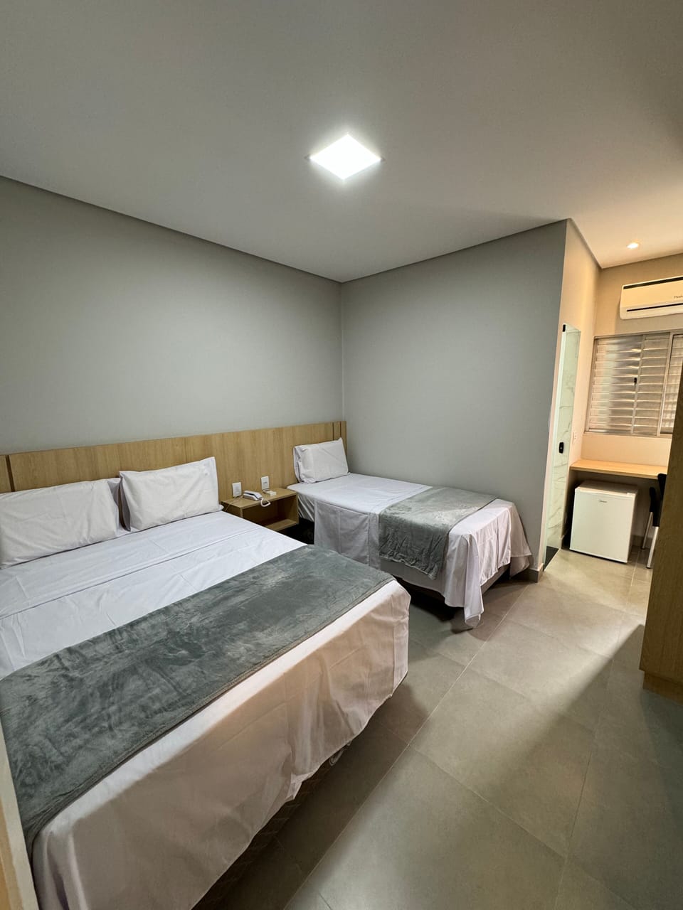Family Triple Room | Bathroom | Shower, towels, soap, shampoo